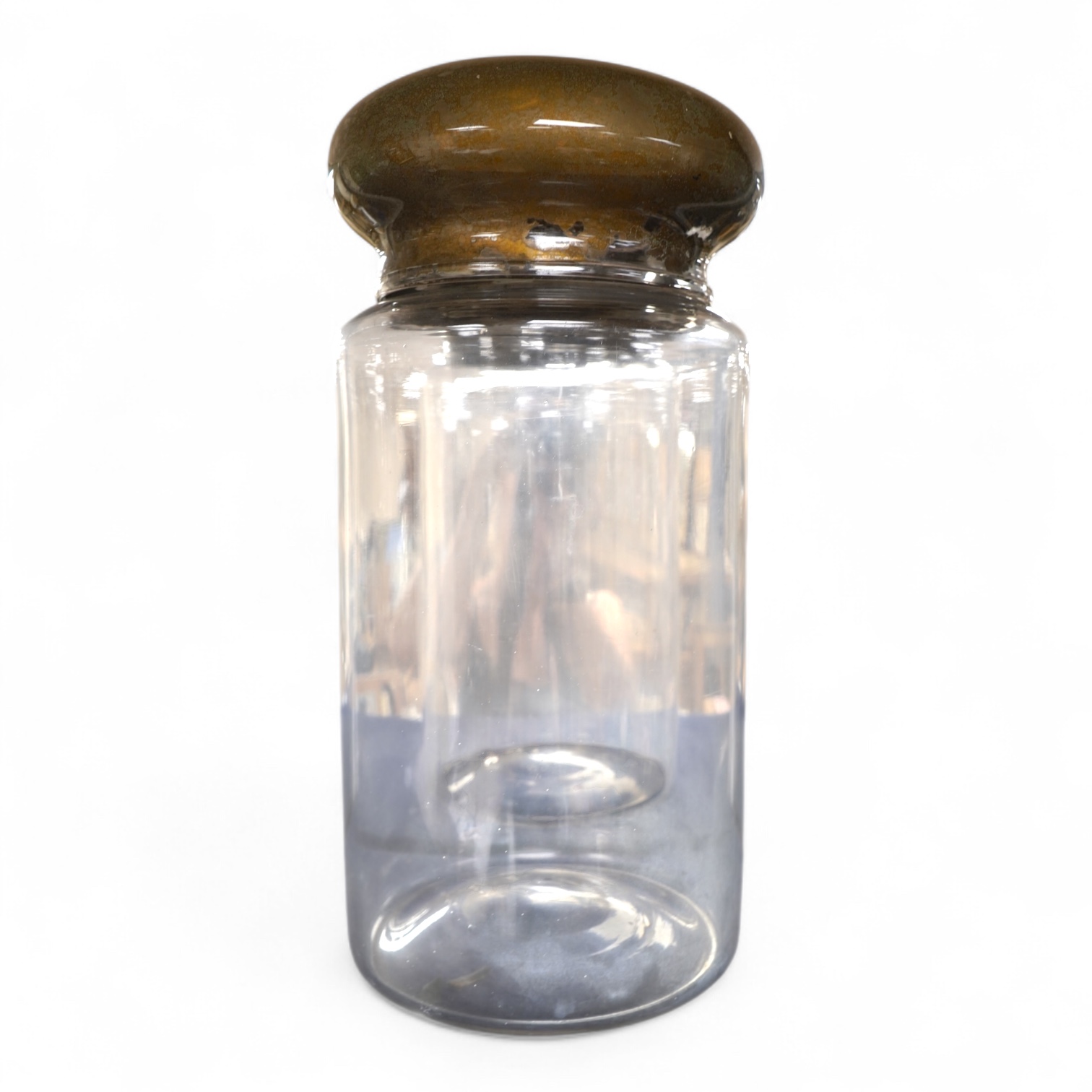 An 18th century cylindrical glass drug jar with remnants of gilding to the lid, 42cm high